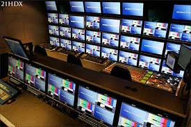 MobileTV with POINT-HD inside of the truck showing production area and tv monitor stack