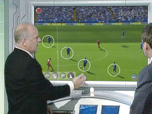 Point-HD Enhances Productions & Retains Viewer Attention Showing broadcast show presenters using studio touchscreen to highlight on soccer game video